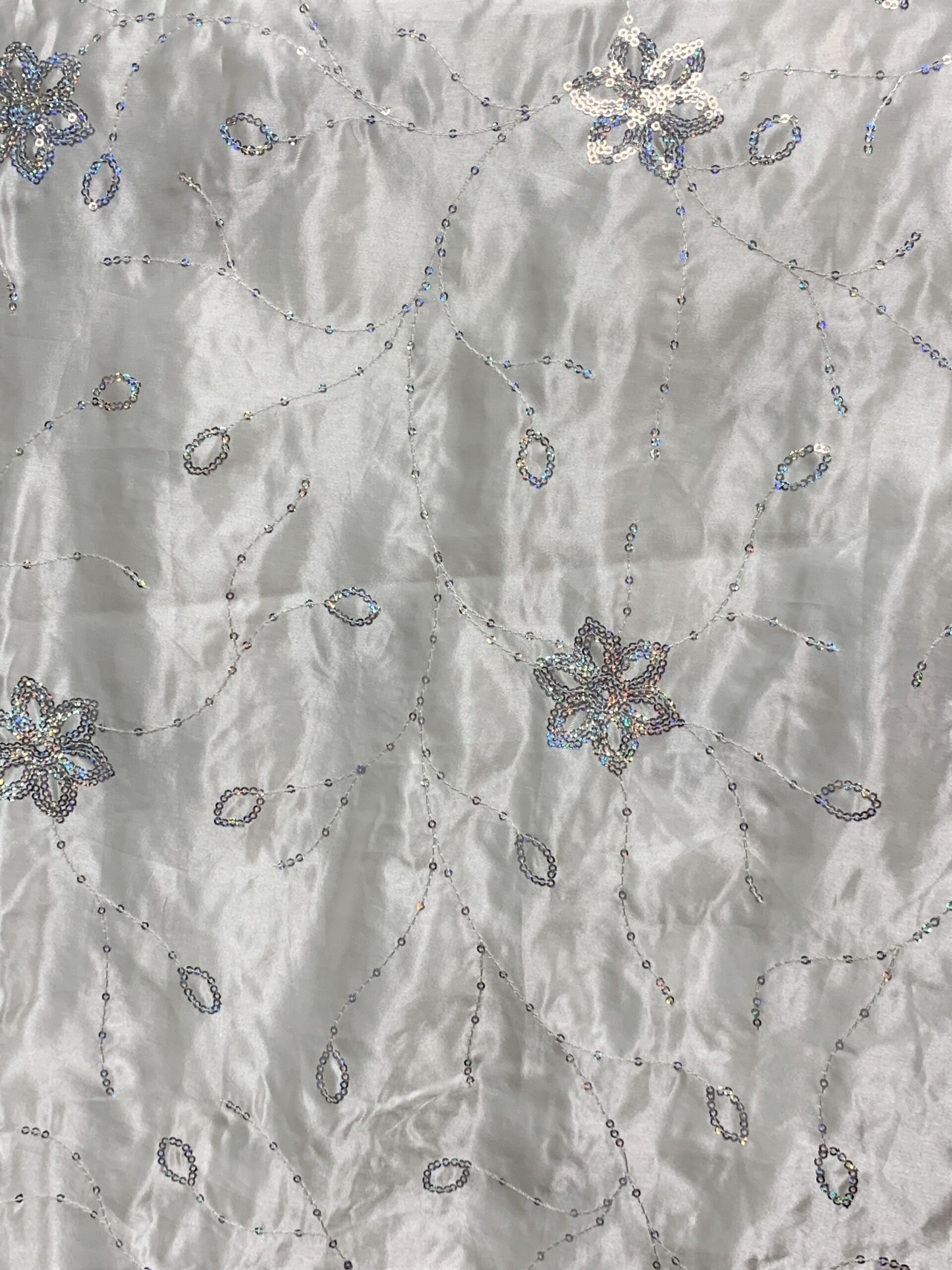 IVORY-SATIN-WITH-SILVER-FLORAL-SEQUIN-1.jpg
