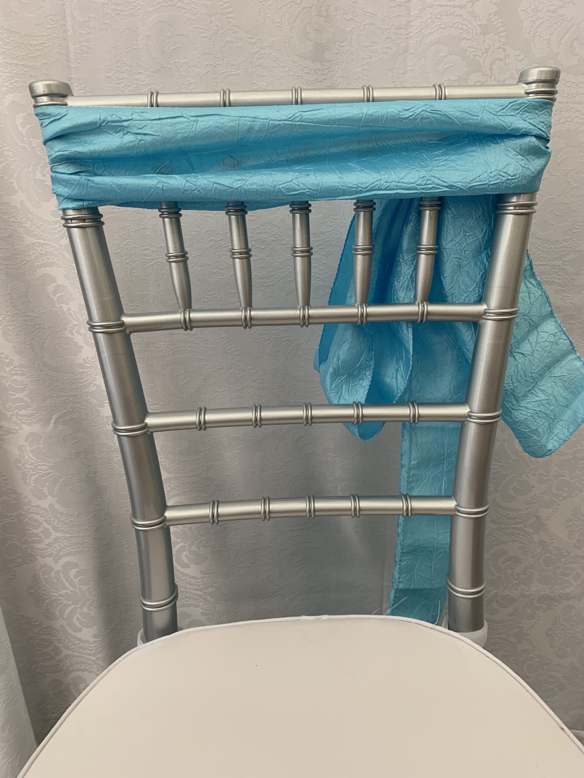 LIGHT-BLUE-CRUSHED-TAFFETA-CHAIR-SASH-e1579190846963.jpg